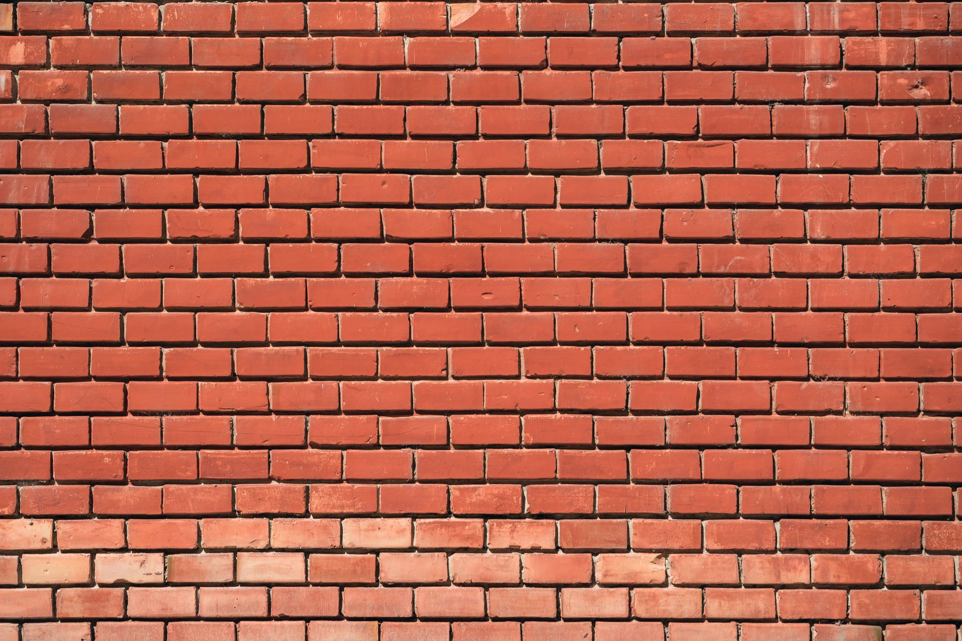 chevilles mur brique rouge