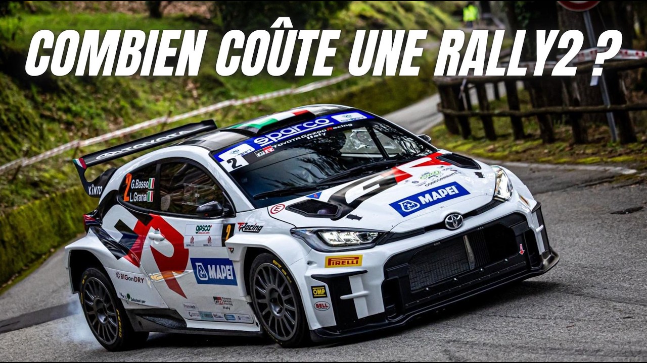 Voiture de rally engagée sur une épreuve spéciale, en appui dans un virage de montagne